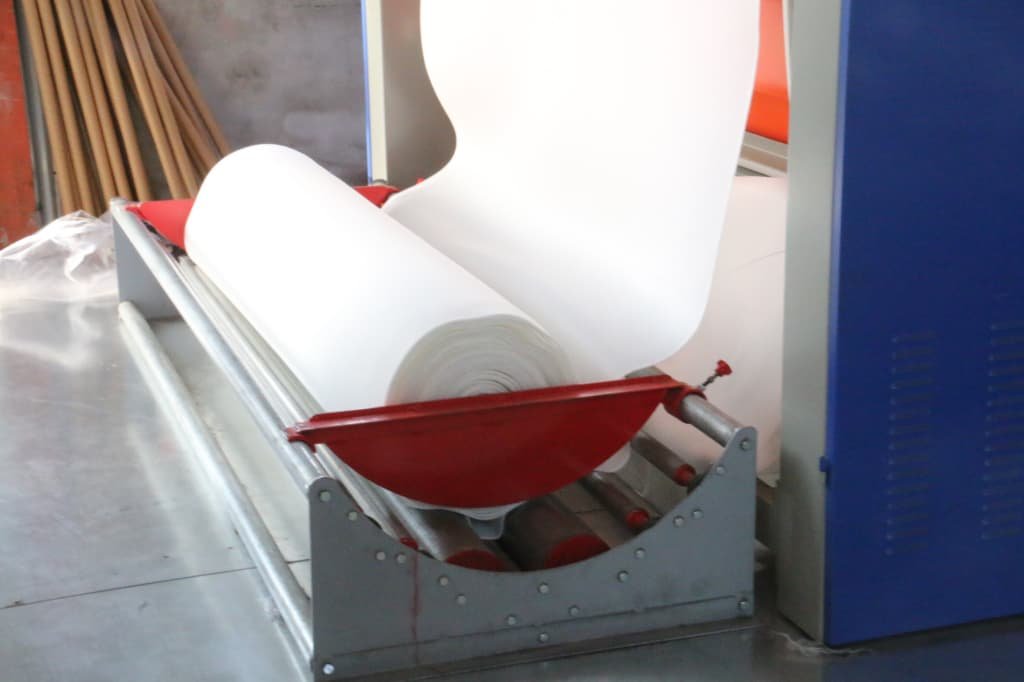 Japan mattress manufacturer quality inspection -- roll-by-roll fabric grading process